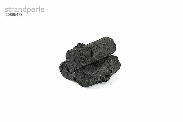 Natural wood charcoal isolated on white background. Pile of coal isolated on white background