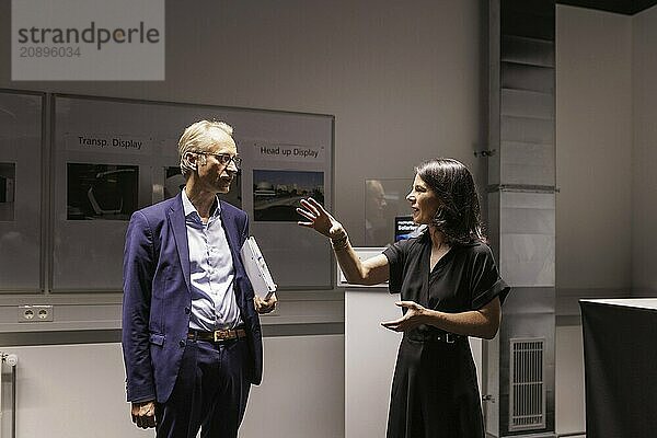 Bernhard Ohnesorge  Managing Director of Carl Zeiss Jena GmbH  and Annalena Bärbock (Alliance 90/The Greens)  Federal Foreign Minister  taken during a visit to the Carl Zeiss Group during the Foreign Ministers trip to Germany in Jena  31 July 2024