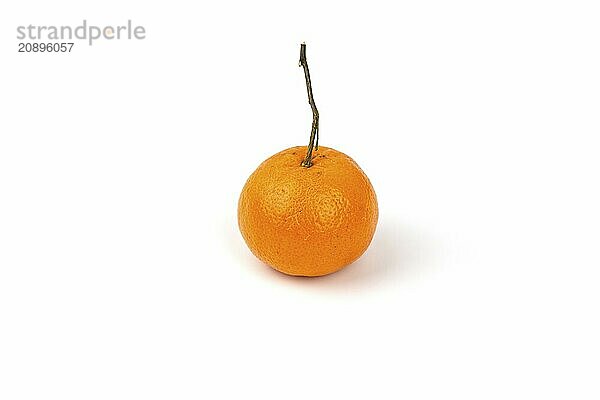 An orange fruit with orange leaves isolated on a white background