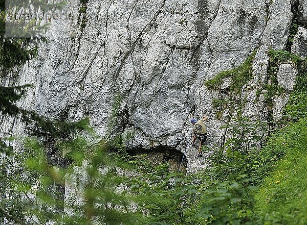 A man climbs a route on the Spitzsteinwand in Erl  14.07.2024