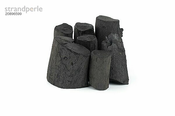 Natural wood charcoal isolated on white background. Pile of coal isolated on white background