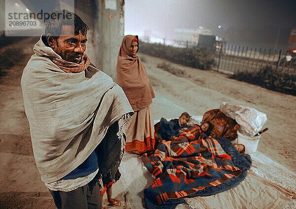 New Delhi  India  21.01.2010  Homeless family with children. Sleeping place under a bridge  India  Asia