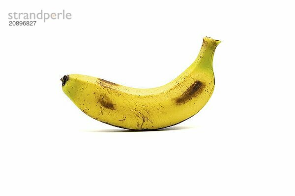 Single banana isolated on white background