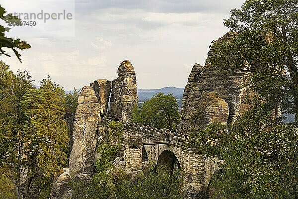 The Bastei is a rock formation with a viewing platform in Saxon Switzerland on the right bank of the River Elbe in the municipality of Lohmen between the spa town of Rathen and the town of Wehlen. It is one of the most visited tourist attractions in Saxon Switzerland. Bastei Bridge  Saxon Switzerland  Rathen  Saxony  Germany  Europe