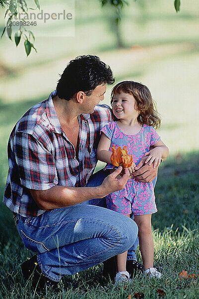 Family. Father & little daughter outdoors in the park.