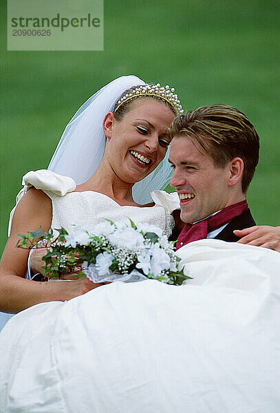 Lifestyle. Wedding couple. Bride and groom outdoors.