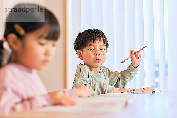 Japanese kids studying at home