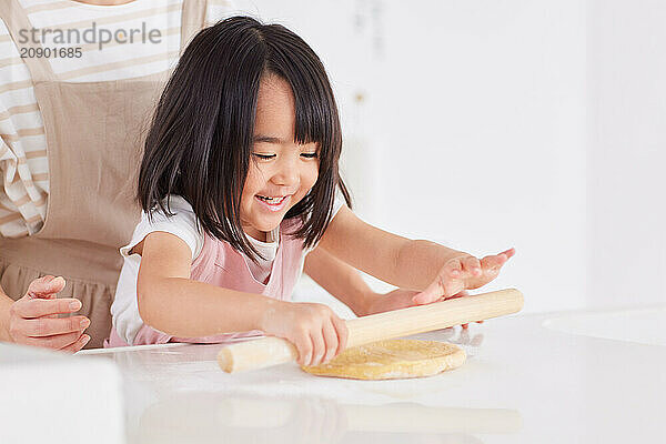 Japanese mother and daughter cooking in the kitchen