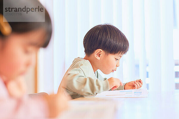 Japanese kids studying at home