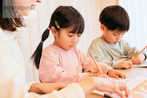 Japanese kids studying at home