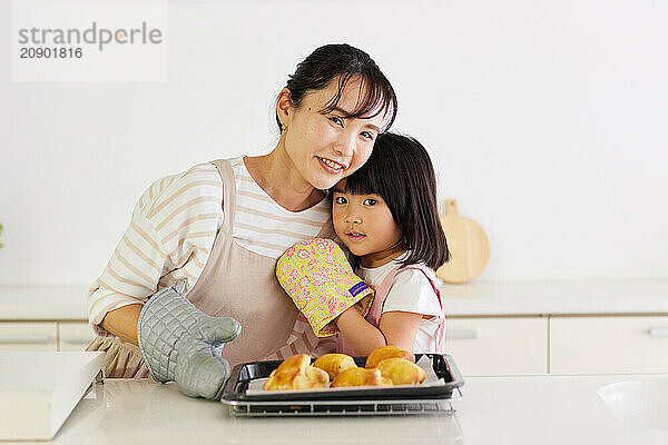 Japanese mother and daughter cooking in the kitchen