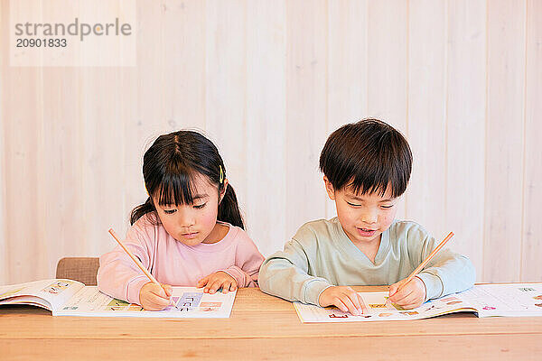 Japanese kids studying at home