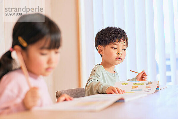 Japanese kids studying at home