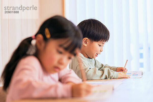 Japanese kids studying at home