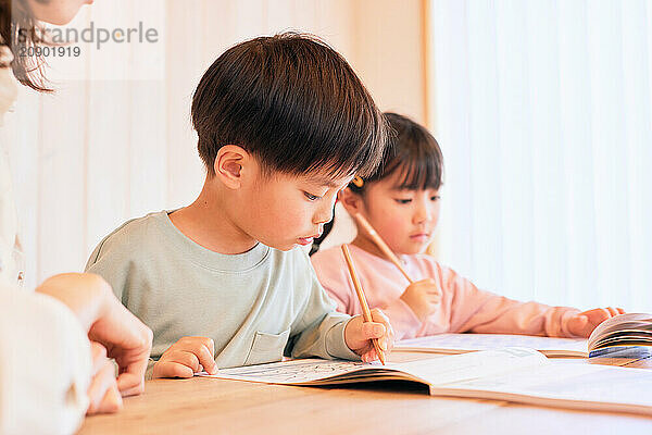 Japanese kids studying at home