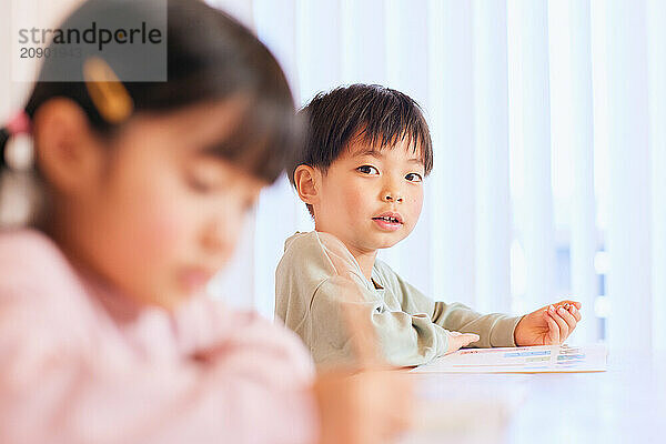 Japanese kids studying at home