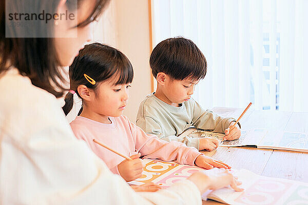 Japanese kids studying at home