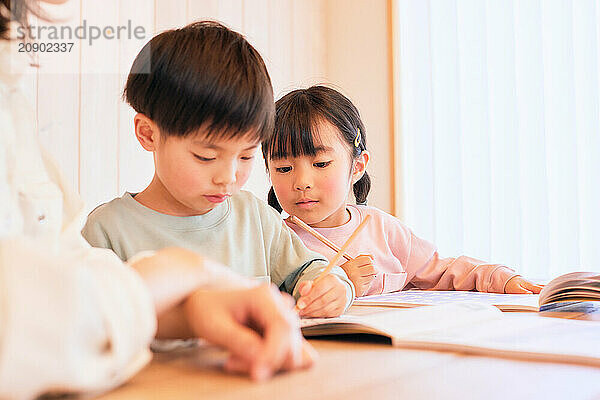 Japanese kids studying at home