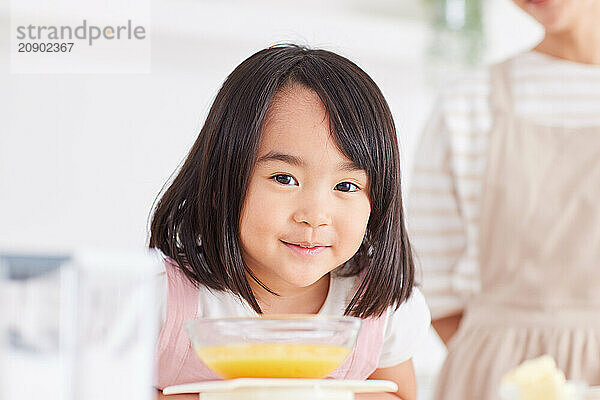 Japanese mother and daughter cooking in the kitchen