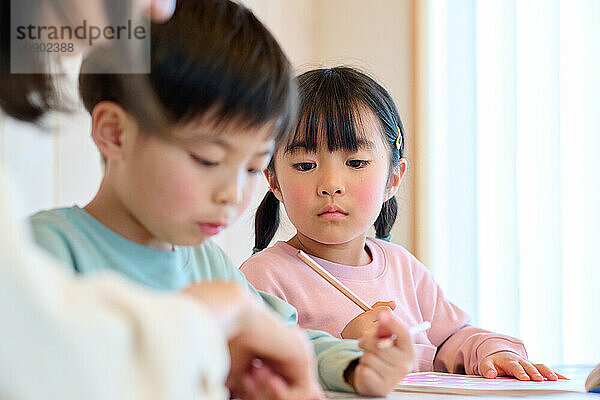 Japanese kids studying at home