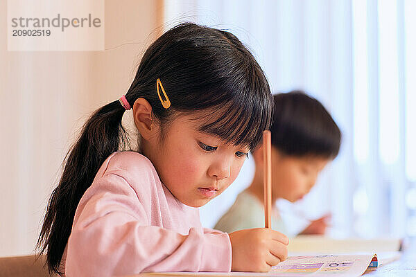 Japanese kids studying at home