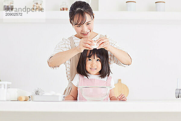 Japanese mother and daughter cooking in the kitchen