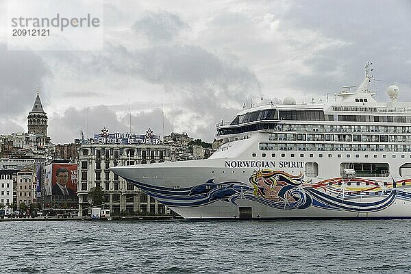 Close-up of the cruise ship 'Norwegian Spirit' in front of the silhouette of the Galata Tower  Istanbul  Istanbul Province  Turkey  Asia