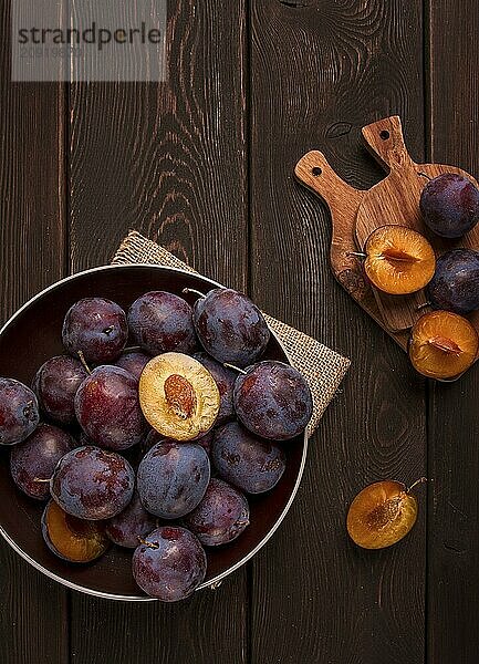 Blü plum  on a wooden table  top view  close-up  no people