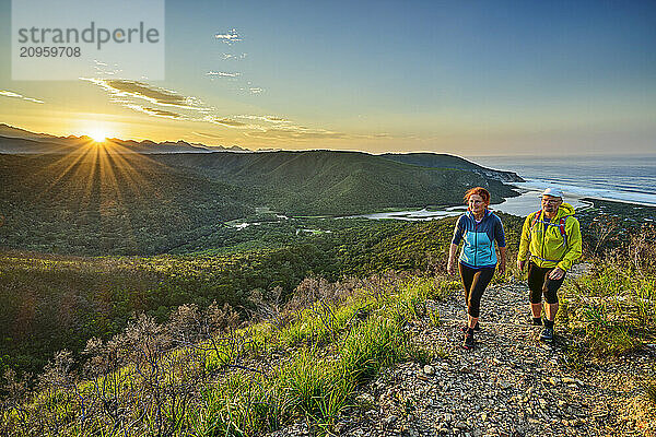 Man and woman hiking on Kalander Kloof trail in Tsitsikamma Section  Garden Route National Park  Western Cape  South Africa