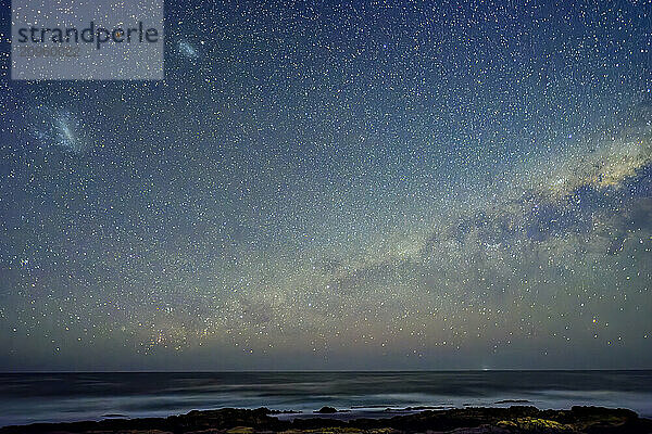 Idyllic milky way over Indian Ocean at night in Eastern Cape  South Africa