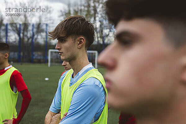 Soccer players getting trained on field