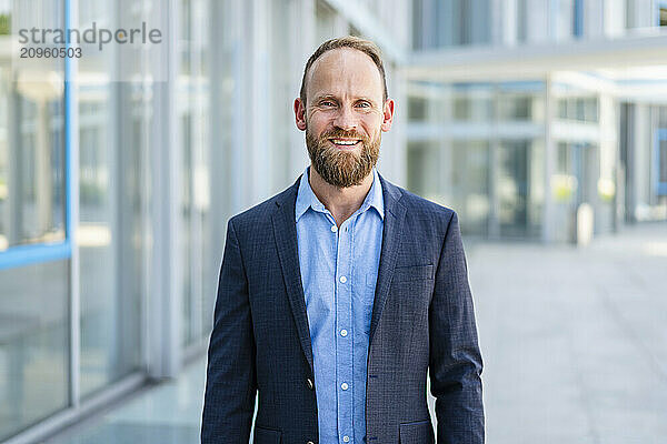 Portrait of a successful businessman in office building