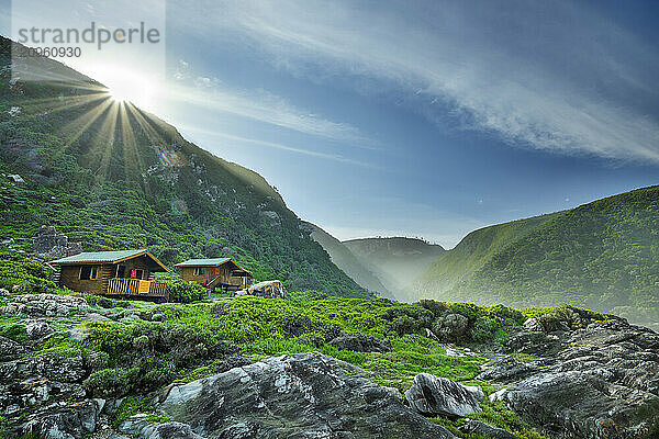 Oakhurst huts near mountains at Otter trail in Tsitsikamma Section  Garden Route National Park  Eastern Cape  South Africa