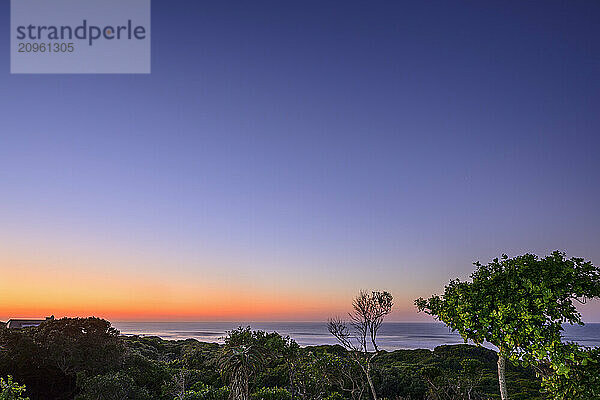 Dawn with dramatic sky over Indian Ocean at Addo Elephant National Park in Eastern Cape  South Africa