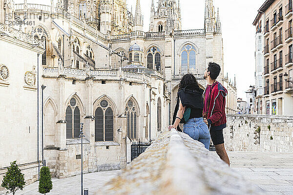 Couple standing in front of Burgos Cathedral