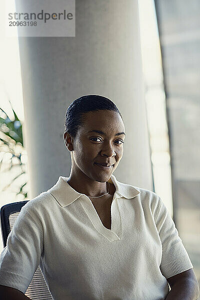 Confident businesswoman sitting at office