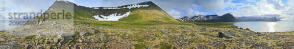 360 degree pano of backpackers on Hafnarfjall ridge with views of Hlouvik Bay  West Fjords  Iceland