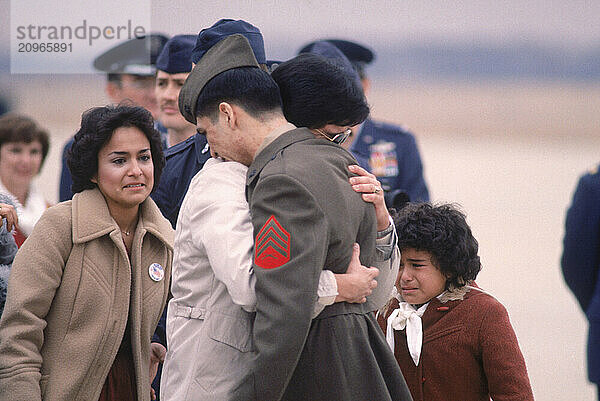 A soldier returns home after serving in the military.