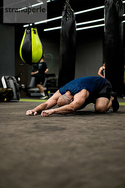 Man training in boxing in the gym.