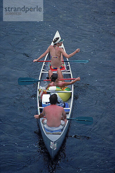 People on a canoe.