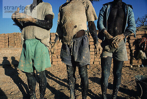 Mud brick laborers of the Moli Dogon tribe  Mali