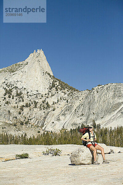 A woman backpacking in Yosemite National Park  California.