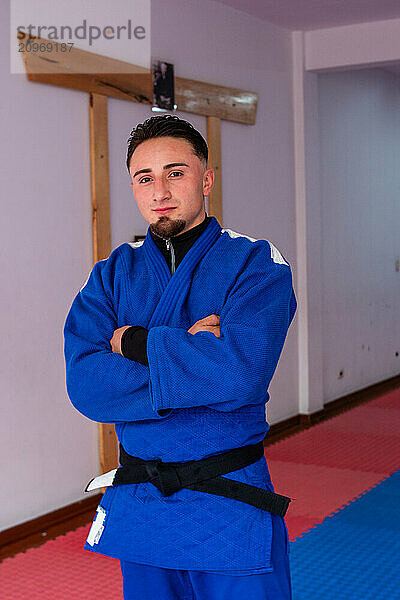 Judo fighter portrait in dojo