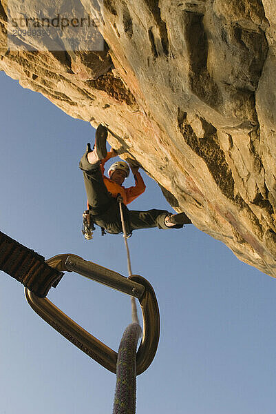 Man above protection hook  Salt Lake City  Utah.