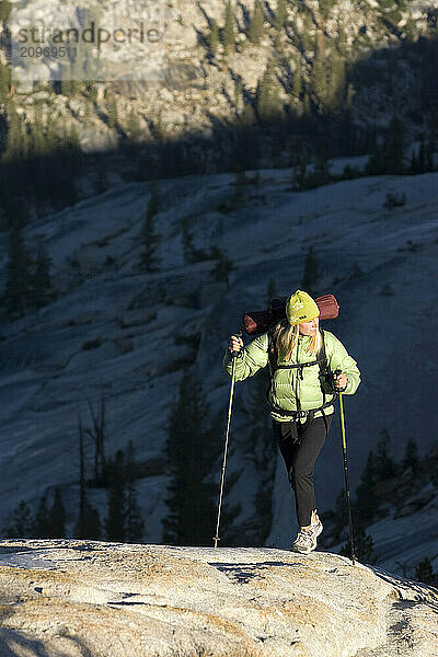 A woman backpacking in Yosemite National Park  California.