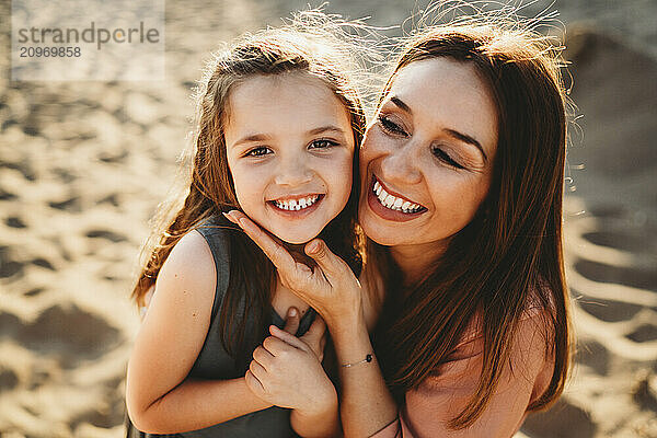 Stunning Spanish Mother and daughter with beautiful smile teeth