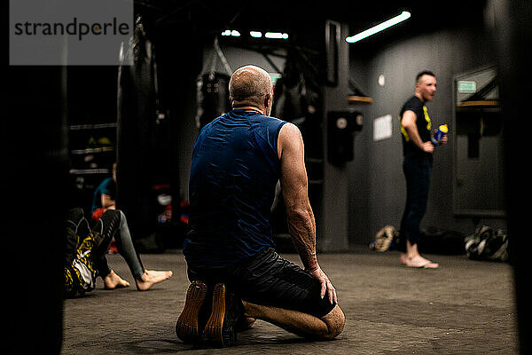 Man training in boxing in the gym.