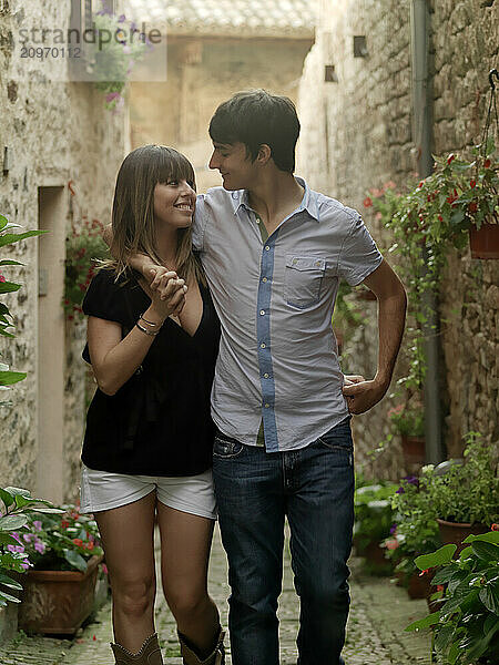 Young Italian couples enjoying each other's company in the city of Spello  Italy.