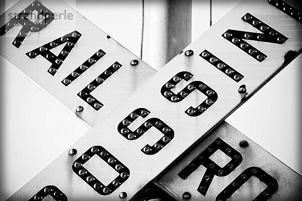 Detail of a rail road crossing sign.