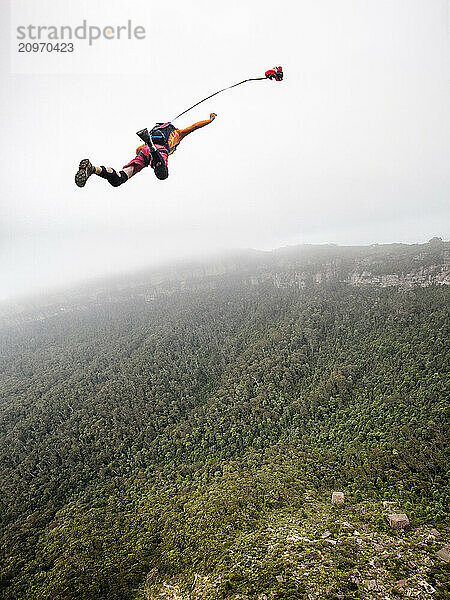 BASE jumper in a free fall in the Blue Mountains  Australia